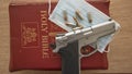 A gun, bible, Covid mask and ammo Royalty Free Stock Photo