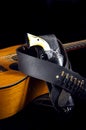 Gun Revolver With Brown Guitar Royalty Free Stock Photo