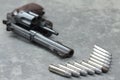 Gun revolver and bullet Royalty Free Stock Photo