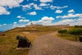 Gun at the road entrance to the old fortress. Castle San Pedro de la Roca del Morro, Santiago de Cuba, Cuba, Castle San Pedro de l Royalty Free Stock Photo