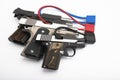 Gun safety , Locked disarmed and secured automatic guns on white background Royalty Free Stock Photo