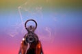 Gun with smoking barrel recorded in the studio Royalty Free Stock Photo