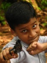 Gun toting boy Royalty Free Stock Photo