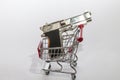 Gun in a shopping cart. gun toy.a shop for all kinds of weapons.