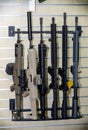 Gun wall rack with rifles Royalty Free Stock Photo