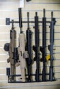 Gun wall rack with rifles Royalty Free Stock Photo