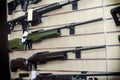 Gun wall rack with rifles Royalty Free Stock Photo