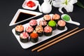 Gunkan sushi set with salmon, tuna, perch, eel, scallop, caviar, shrimp, sharp. Traditional Japanese cuisine. Royalty Free Stock Photo