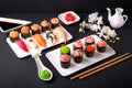 Gunkan sushi set with salmon, tuna, perch, eel, scallop, caviar, shrimp, sharp. Traditional Japanese cuisine. Royalty Free Stock Photo