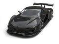 Gunmetal black super car - top down studio shot Royalty Free Stock Photo