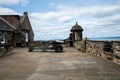 A gunner is cleaning One O`Clock gun in Edinburgh Castle