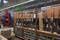 Guns in display case at Walmart