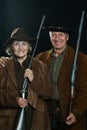 Gunslingers in western garment Royalty Free Stock Photo