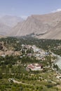 Gunt River with the city of Khorog in the Wakhan valley in Tajikistan with the Pamir mountains Royalty Free Stock Photo