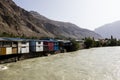 Gunt River with houses in Khorog in the Wakhan valley in Tajikistan Royalty Free Stock Photo