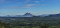 Gunung Sinabung active volcano mountain seen from lake Toba. Beautiful scenery Karo batak farm lands near Berastagi Royalty Free Stock Photo