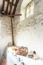 Jesus and lobster pot,inside Grade 1 listed Church of Saint Winwaloe`s,on the Southern Cornish coast Royalty Free Stock Photo