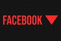 Red colored banner with facebook written on it
