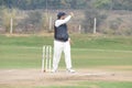 Gurgaon India Ã¢â¬â March 3 2019 : Full length of cricketer playing on field during sunny day, Cricketer on the field in action