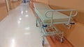 Gurney or wheeled stretcher at hospital corridor. long corridor in hospital with surgical transport