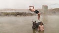 Young boy jumping into thermal water from his horse, Guroymak, Bitlis Royalty Free Stock Photo