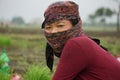 Chitwan Nepal September 10 2020 : Gurung woman with a scarf posing for a camera from Chitwan Nepal