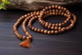 gurus sandalwood necklace on a plain cloth Royalty Free Stock Photo