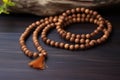 gurus sandalwood necklace on a plain cloth