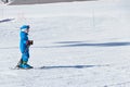 Gusar - Azerbaijan: January 2019. Child skiing in mountains. Ski race for young children. Winter sport. Little skier