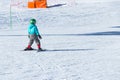 Gusar - Azerbaijan: January 2019. Child skiing in mountains. Ski race for young children. Winter sport. Little skier