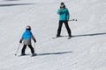 Gusar - Azerbaijan: January 2019. Little boy learning skiing with his father during winter holidays in Shahdag Mountain