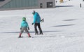 Gusar - Azerbaijan: January 2019. Little boy learning skiing with his father during winter holidays in Shahdag Mountain