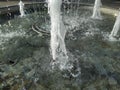 Gush of water fountain. Water splash in the fountain. Royalty Free Stock Photo