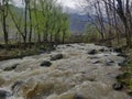 A gushing water stream captured in Kashmir Royalty Free Stock Photo