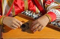 Gusli folk musical Russian instrument in men`s hands