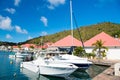 Gustavia, st.barts - January 25, 2016: sailboats and yachts anchored at sea pier on tropical beach. Yachting and sailing. Luxury t Royalty Free Stock Photo