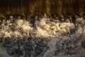 Gusting water under a weir