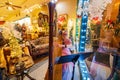 Night view of the Victorian Walk with a girl dress up in historical outfits playing harp