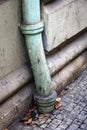 Gutter downpipe on a old wall Royalty Free Stock Photo