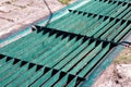 Gutters drain grate, drain cover. Road drains - sewer cover. iron grate of water drain on the road in every city. Water go down to Royalty Free Stock Photo