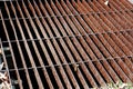 Gutters drain grate, drain cover. Road drains - sewer cover. iron grate of water drain on the road in every city. Water go down to Royalty Free Stock Photo