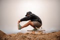 Guy with balance board on the mountain Royalty Free Stock Photo