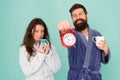 Guy in bath clothes hold tea coffee. Breakfast concept. Every morning begins with coffee. Couple in bathrobes with mugs