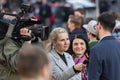 A guy being interviewed at the demonstration on Prague Wenceslas square against the current government and Babis