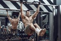 Guy bodybuilder do chin-ups Royalty Free Stock Photo
