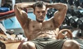 Guy bodybuilder in gym Royalty Free Stock Photo