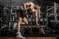 Guy bodybuilder with dumbbell Royalty Free Stock Photo