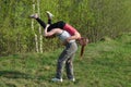 Guy carries a girl on his back Royalty Free Stock Photo