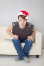 Guy in Christmas cap having stare wide-eyed Royalty Free Stock Photo