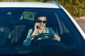 Guy driving a white car Royalty Free Stock Photo